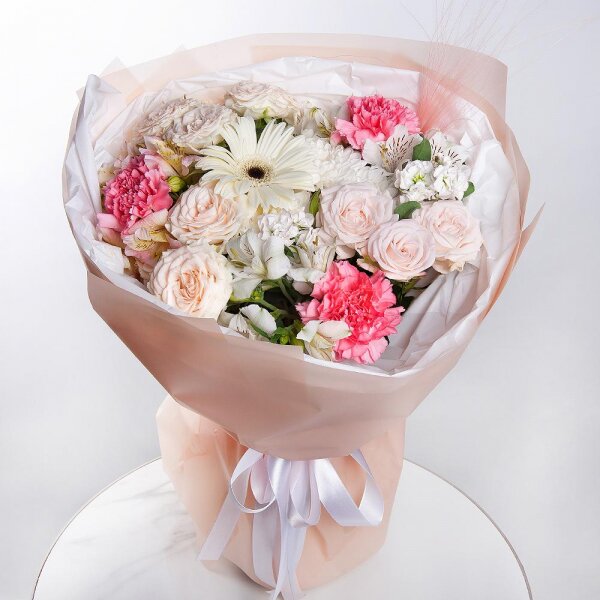 Baltica White Spray Chrysanthemum - 1, Peony sprayrose - 3, Pink carnation - 3, Alstromeria white, soft pink - 3, White Matthiola - 2, Gerbera white - 1, Dried flowers in assortment, Pistachio, Wrapping Paper