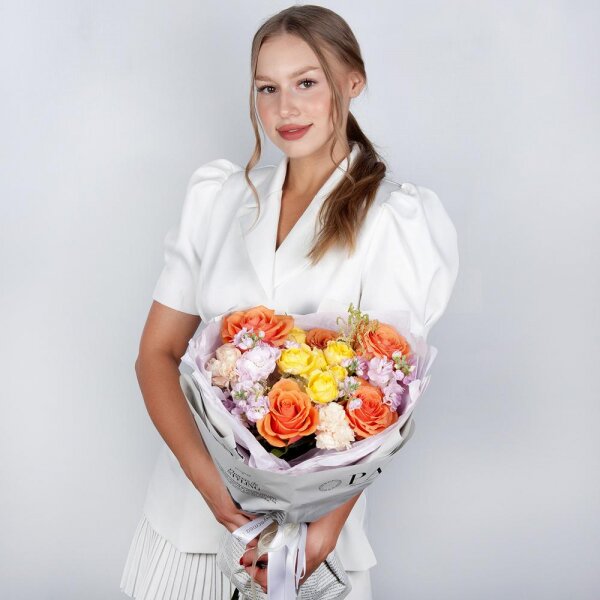Rose Ecuador 50 cm - 5, Spray rose: yellow, orange 50 cm - 1, Baltica White Spray Chrysanthemum - 1, Carnation white, cream - 2, Matthiola Lilac - 2, Astilbe, Wrapping Paper