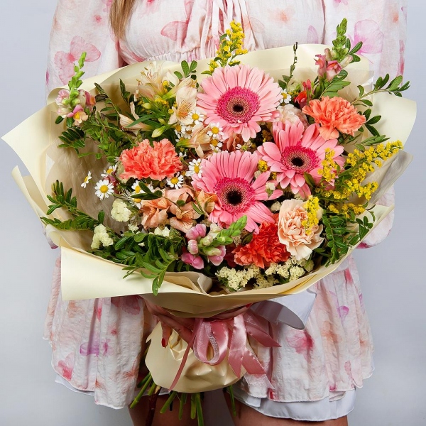 Gerbera pink - 3, Chamomile - 2, Pink carnation - 5, Alstromeria white, soft pink - 4, Pink Matthiola - 3, Carnation white, cream - 4, Solidago (1 pc.), Yellow Statice, Pistachio, Wrapping Paper
