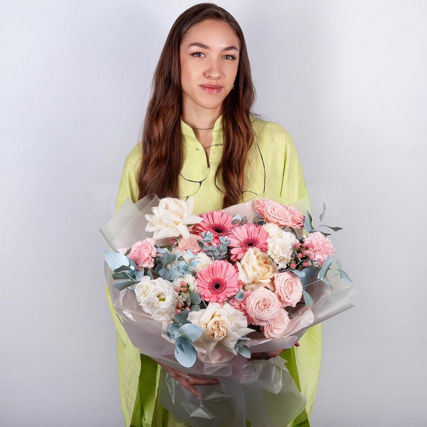 Gerbera pink - 3, Peony style roses - 3, Baltica White Spray Chrysanthemum - 1, lisianthus - 2, Pink carnation - 11, Peony sprayrose - 3, Hypericum, Eucalyptus, Wrapping Paper
